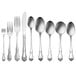 A row of Oneida Arbor Rose stainless steel bouillon spoons.