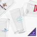 A group of Acopa customizable pint glasses on a white background.