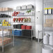 A room with Regency chrome wire shelving filled with food.