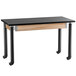 A black and wood science lab table with wheels.
