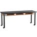 A black National Public Seating science lab table with black legs.