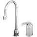 A chrome T&S single lever faucet with a metal handle.