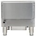 A stainless steel Globe gas lava rock charbroiler with a silver lid.