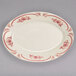 A white Homer Laughlin china platter with pink flowers on it.