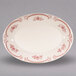 A white Homer Laughlin china platter with red flowers.