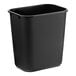 A black plastic Lavex rectangular trash can.