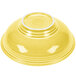 A yellow Fiesta pedestal serving bowl with a white rim.