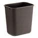 A black plastic rectangular Lavex wastebasket.