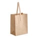 A brown paper bag with handles.