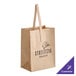 A brown paper bag with handles.