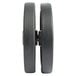 A close up of two black rubber wheels.