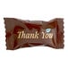 A brown package of Thank You Chocolate Buttermints with white text.