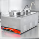 An Avantco stainless steel countertop food warmer with two pots in it.