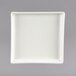 A white rectangular china appetizer tray.