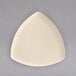 A white triangle shaped Homer Laughlin china plate.