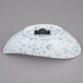 A white and blue speckled porcelain canoe tid bit bowl.