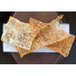 A rectangular white porcelain platter with chips on it.