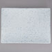 A white rectangular porcelain platter with blue specks on the surface.
