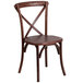 A Flash Furniture mahogany wood banquet chair with a cross back and cushion.