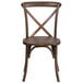 A Flash Furniture Early American wood stackable cross back chair.