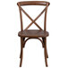 A Flash Furniture Hercules pecan wood stackable cross back chair.