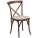 A Flash Furniture wooden banquet chair with a white cushioned seat.