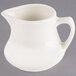 A Homer Laughlin ivory china jug creamer with a handle.