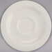 A Homer Laughlin ivory china saucer with a circle in the middle.