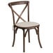 A Flash Furniture wooden banquet chair with a white cushion.