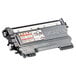 A close-up of a Brother TN450 black toner cartridge with a label.