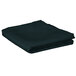 A folded hunter green cloth table cover.