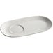 A Tuxton AlumaTux Pearl White oval china platter with a circle in the middle.