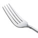 A Oneida stainless steel dessert fork with a silver handle.