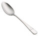 A close-up of the silver bowl and handle of a Oneida Astragal stainless steel oval bowl spoon.