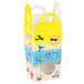 A yellow and white Beach Window candy box with images of the beach on it.