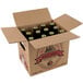 A white cardboard box with brown Reading Soda Works White Birch bottles inside.