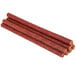 A pile of Weaver's mild beef sticks on a white background.