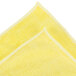 a yellow towel with white edge