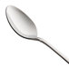 A Oneida stainless steel iced tea spoon with a silver handle.