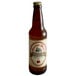 A brown Reading Soda Works Ginger Beer bottle with a white label.