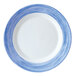 An Arcoroc opal glass side plate with blue and white stripe design.