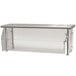 A stainless steel food shield with clear glass panels on a stainless steel shelf.