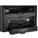 A Canon imageCLASS monochrome laser printer on a tray.
