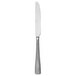 A silver Oneida Jade stainless steel dinner knife with a pattern on the handle.