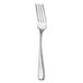 A silver fork with a white handle.