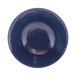 A white melamine bowl with a dark blue rim.