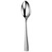 An Oneida stainless steel serving spoon with a textured handle.