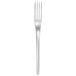 A silver fork with a white background.