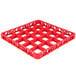 A red plastic Carlisle glass rack extender with 25 compartments.