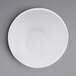 An Elite Global Solutions white melamine bowl on a gray background.